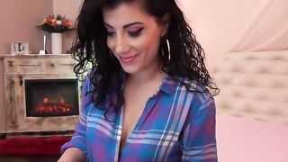 Asshantiy - Charming brunette in a shirt teases in front of the camera