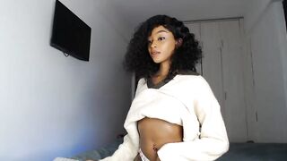 dollyjenne  - Young mulatto girl trumpets her big ass in front of the camera in her panties