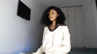 dollyjenne  - Young mulatto girl trumpets her big ass in front of the camera in her panties