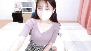 MAIxxz9 -  Young Asian girl sweetly chatting and teasing in front of the camera.