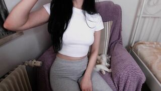 Emi21 -  Skinny babe in clothes sweetly chatting and teasing in front of the camera