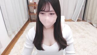 momoxco - Young Asian girl in clothes sweetly chatting and teasing in front of the camera