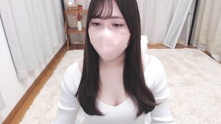 momoxco - Young Asian girl in clothes sweetly chatting and teasing in front of the camera