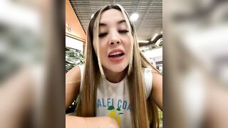 Alexa_fort - The young woman is having a nice conversation and filming herself on camera on the street