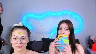 Bad_Party - Young lesbian babes sweetly chatting and teasing in front of the camera.