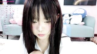 Hnny_y - Young Asian girl sweetly chatting and teasing in front of the camera