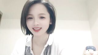 jiujiiu66 - Cute Asian girl chatting and doesn't want to undress in front of the camera