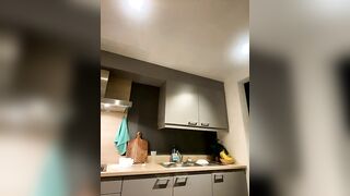 JulieLittleLove - young bitch with small tits sweetly chatting and teasing in front of the camera in the kitchen.