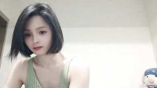 jiujiiu66 - Charming Asian girl is sweetly chatting and doesn't want to undress in front of the camera