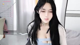 MayaSally - Young Asian girl sweetly chatting and teasing in front of the camera with her big tits