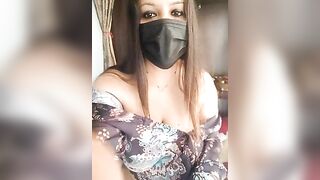 Reena_Darling - A mulatto girl sweetly chatting and teasing on camera.